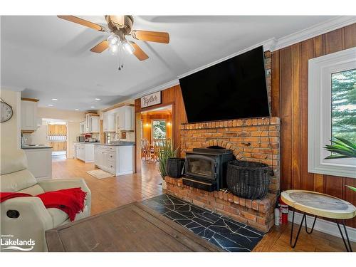 1006 Spring Lake Road, Dwight, ON - Indoor Photo Showing Living Room With Fireplace