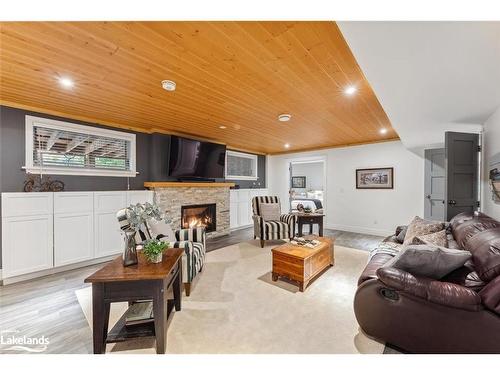 33 South Harbour Drive, Bobcaygeon, ON - Indoor Photo Showing Living Room With Fireplace