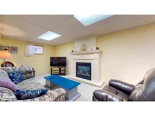 80 Downer Crescent, Wasaga Beach, ON - Indoor Photo Showing Basement With Fireplace