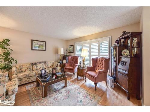 56 Tecumseth Pines Drive, New Tecumseth, ON - Indoor Photo Showing Living Room