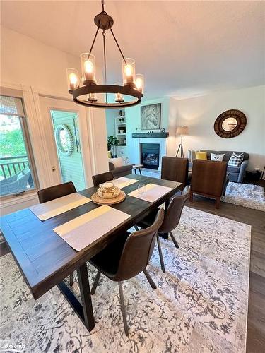 2621 Grandview Forest Glen Drive, Huntsville, ON - Indoor Photo Showing Dining Room With Fireplace