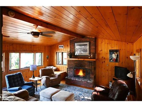 1 Brill'S Island, Nipissing Twp, ON - Indoor Photo Showing Living Room With Fireplace