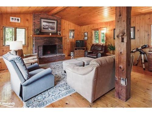 1 Brill'S Island, Nipissing Twp, ON - Indoor Photo Showing Living Room With Fireplace