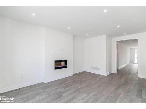 3 Rosanne Circle, Wasaga Beach, ON - Indoor Photo Showing Other Room With Fireplace