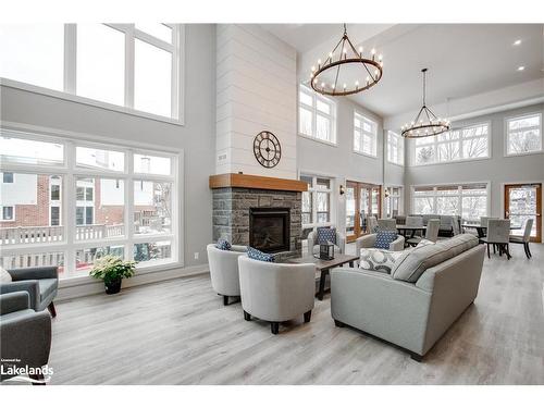 301-200 Anglo Street, Bracebridge, ON - Indoor Photo Showing Living Room With Fireplace