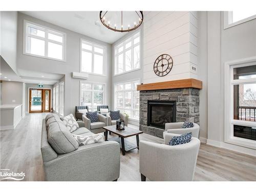 301-200 Anglo Street, Bracebridge, ON - Indoor Photo Showing Living Room With Fireplace