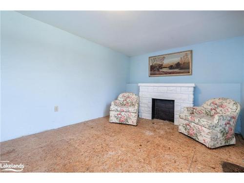 3338 Cox Drive, Severn, ON - Indoor With Fireplace