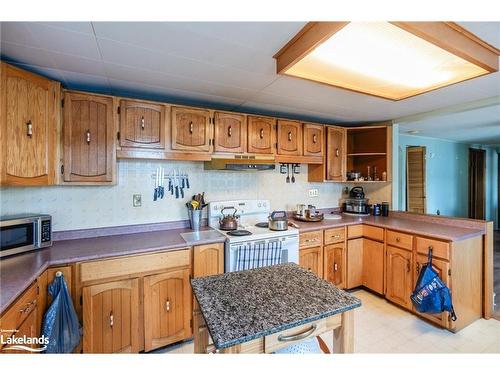 3338 Cox Drive, Severn, ON - Indoor Photo Showing Kitchen With Double Sink