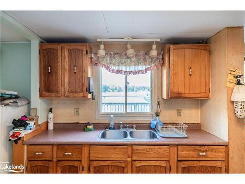 3338 Cox Drive, Severn, ON - Indoor Photo Showing Kitchen With Double Sink