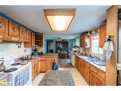 3338 Cox Drive, Severn, ON - Indoor Photo Showing Kitchen With Double Sink