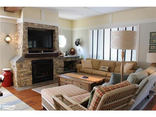 Elm  Wk 2-1020 Birchglen Road, Baysville, ON - Indoor Photo Showing Living Room With Fireplace