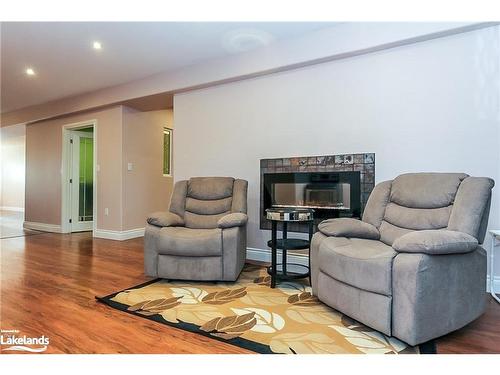 16 Wasaga Sands Drive, Wasaga Beach, ON - Indoor Photo Showing Living Room With Fireplace