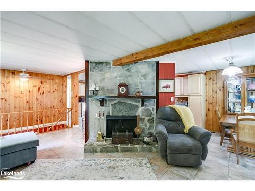 399 Otter Lake Road, Huntsville, ON - Indoor Photo Showing Living Room With Fireplace