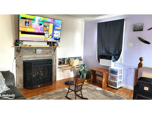 35 Lorne St Street S, Huntsville, ON - Indoor Photo Showing Living Room With Fireplace