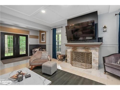 39 Deerfoot Trail, Huntsville, ON - Indoor Photo Showing Living Room With Fireplace