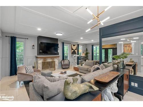 39 Deerfoot Trail, Huntsville, ON - Indoor Photo Showing Living Room With Fireplace