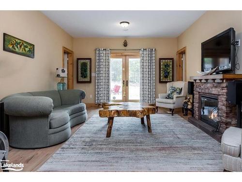 15 Rue De Parc, Tiny Twp, ON - Indoor Photo Showing Living Room With Fireplace