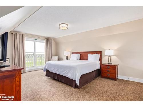 206-115 Fairway Court, The Blue Mountains, ON - Indoor Photo Showing Bedroom