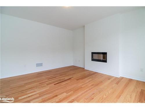 151 Rosanne Circle, Wasaga Beach, ON - Indoor Photo Showing Living Room With Fireplace