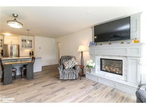 18-44 Trott Boulevard, Collingwood, ON - Indoor Photo Showing Living Room With Fireplace