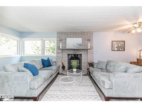 229 Bruce Road 23, Kincardine, ON - Indoor Photo Showing Living Room With Fireplace