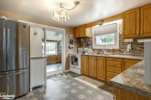 50 Wilson Road W, Tiny, ON - Indoor Photo Showing Kitchen With Double Sink