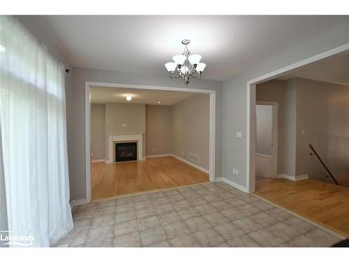 66 White Sands Way, Wasaga Beach, ON - Indoor Photo Showing Other Room With Fireplace