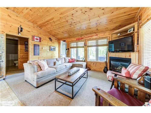 12 Kawartha Crescent, Wasaga Beach, ON - Indoor Photo Showing Living Room With Fireplace