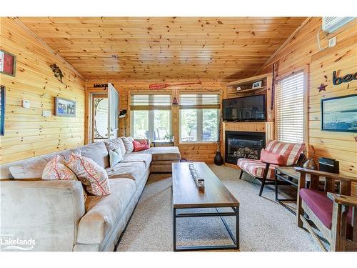 12 Kawartha Crescent, Wasaga Beach, ON - Indoor Photo Showing Living Room With Fireplace