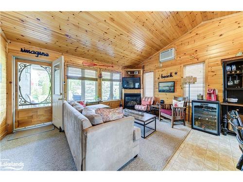 12 Kawartha Crescent, Wasaga Beach, ON - Indoor Photo Showing Living Room With Fireplace