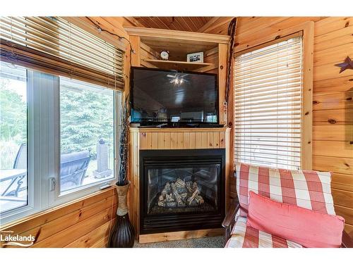 12 Kawartha Crescent, Wasaga Beach, ON - Indoor Photo Showing Living Room With Fireplace