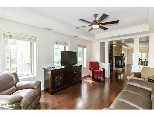 307-130 Steamship Bay Road, Gravenhurst, ON - Indoor Photo Showing Living Room With Fireplace