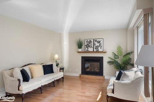 42 Winnifred Avenue, Parry Sound, ON - Indoor Photo Showing Living Room With Fireplace