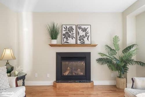 42 Winnifred Avenue, Parry Sound, ON - Indoor Photo Showing Living Room With Fireplace