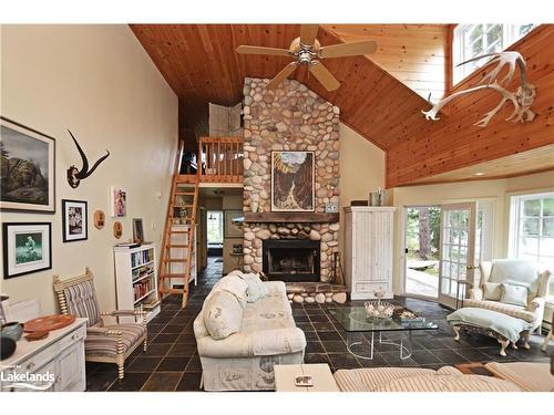 6-29C Mowat Island, Parry Sound, ON - Indoor Photo Showing Living Room With Fireplace