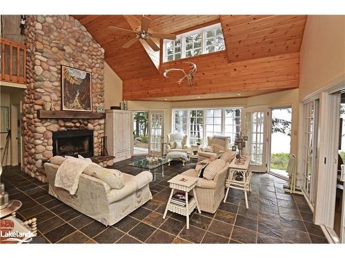 6-29C Mowat Island, Parry Sound, ON - Indoor Photo Showing Living Room With Fireplace