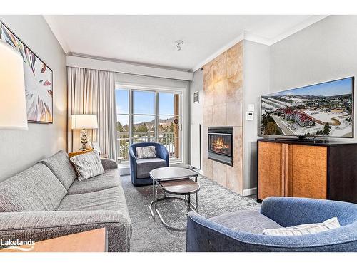 535-220 Gord Canning Drive, The Blue Mountains, ON - Indoor Photo Showing Living Room With Fireplace