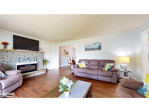 19 Locke Avenue, Stayner, ON - Indoor Photo Showing Living Room With Fireplace