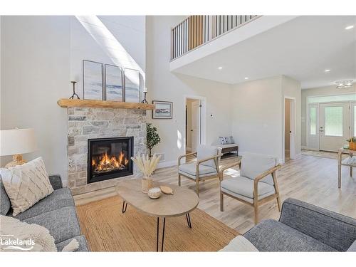 180 Tiny Beaches Road S, Tiny, ON - Indoor Photo Showing Living Room With Fireplace