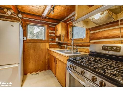 49 Third S/S Street, Tiny, ON - Indoor Photo Showing Kitchen With Double Sink