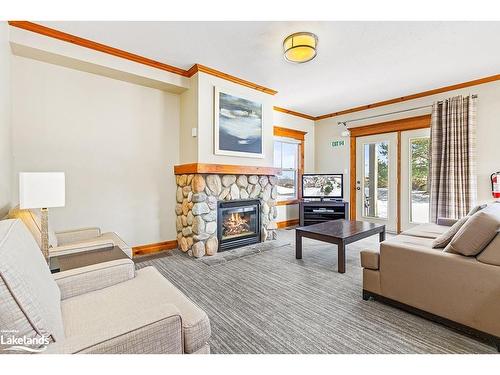 109-184 Snowbridge Way, The Blue Mountains, ON - Indoor Photo Showing Living Room With Fireplace