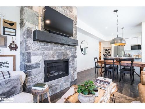 101-18 Beckwith Lane, The Blue Mountains, ON - Indoor Photo Showing Living Room With Fireplace