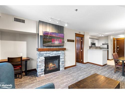 326-152 Jozo Weider Boulevard, The Blue Mountains, ON - Indoor Photo Showing Living Room With Fireplace