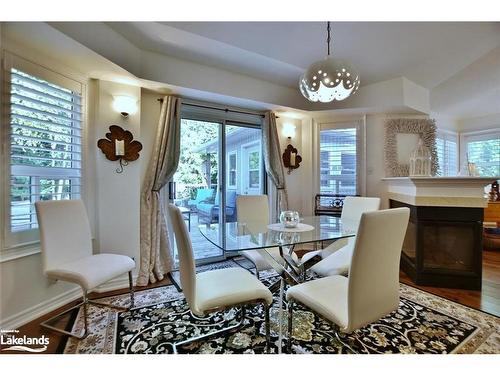 32 Nettleton Court, Collingwood, ON - Indoor Photo Showing Dining Room With Fireplace