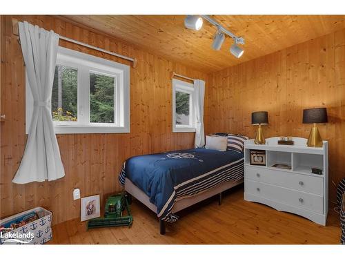 1433 South Horn Lake Road, Ryerson, ON - Indoor Photo Showing Bedroom