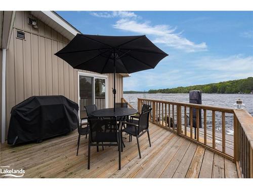 1433 South Horn Lake Road, Ryerson, ON - Outdoor With Body Of Water With Deck Patio Veranda With Exterior