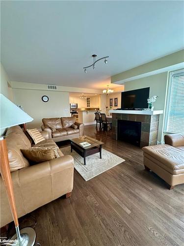 524 Mariners Way, Collingwood, ON - Indoor Photo Showing Living Room With Fireplace