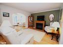 57 Springwood Crescent, Gravenhurst, ON  - Indoor Photo Showing Living Room With Fireplace 