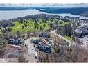 102-4 Tree Tops Lane, Huntsville, ON  - Outdoor With Body Of Water With View 