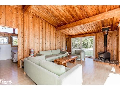 1 B501 Island, Archipelago South, ON - Indoor Photo Showing Living Room With Fireplace